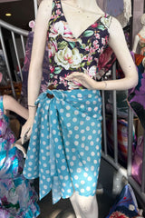 Teal Spot wrap styled as sarong
