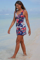 Layla Skirt Bather Blossom Party Annah Stretton – front view showing V-neck crossover bust detail, full lining, high-stretch navy floral fabric with cherries, strawberries, and pink floral print