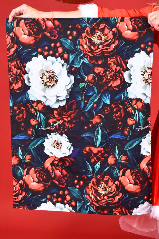 Annah Stretton Merry Bloom Christmas tea towel – festive floral cotton towel