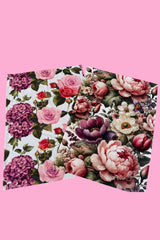 Two floral placemats on a pink background