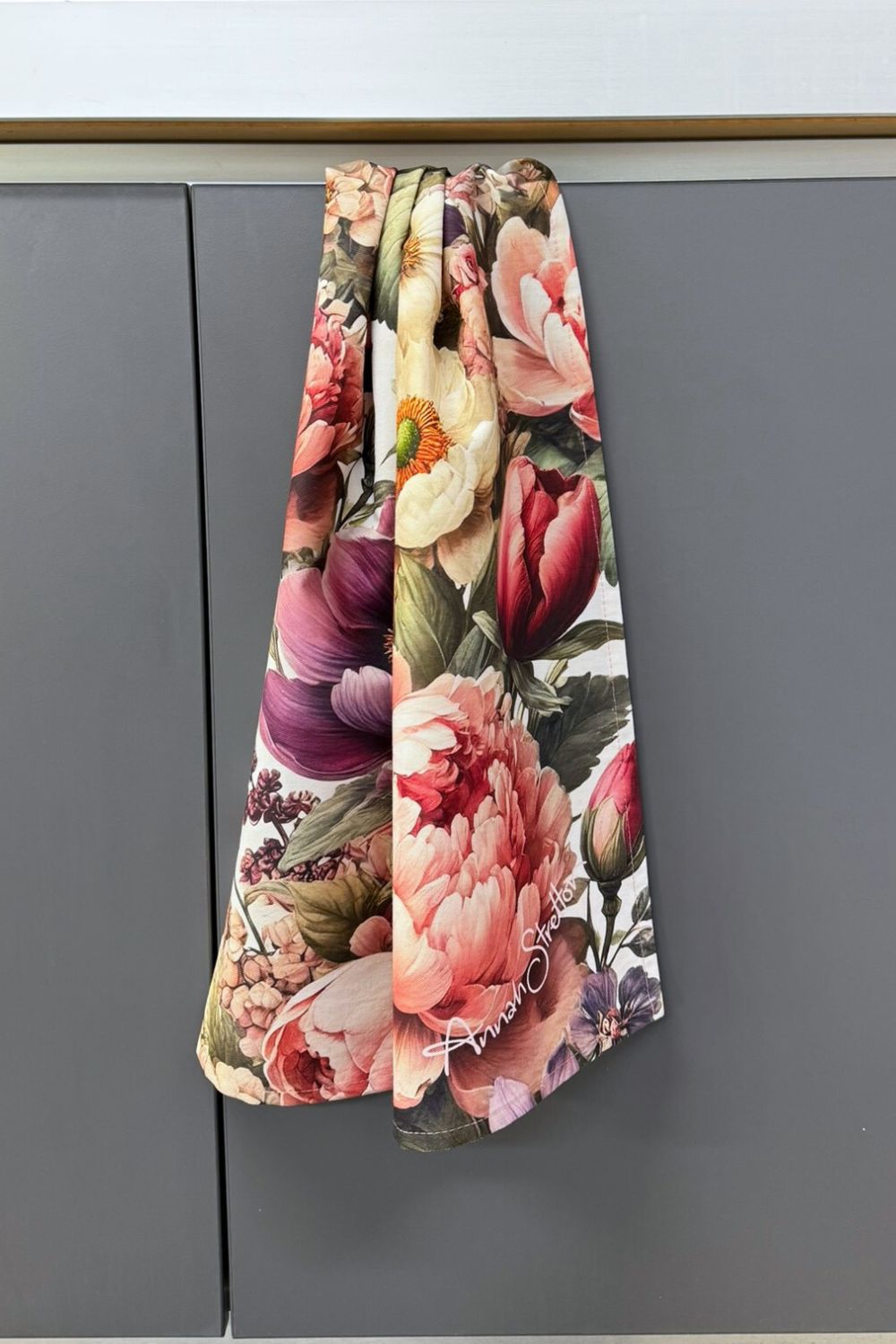 Petal Poem tea towel styled in kitchen – Annah Stretton homeware