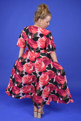 Floral occasion dress with pockets by Annah Stretton