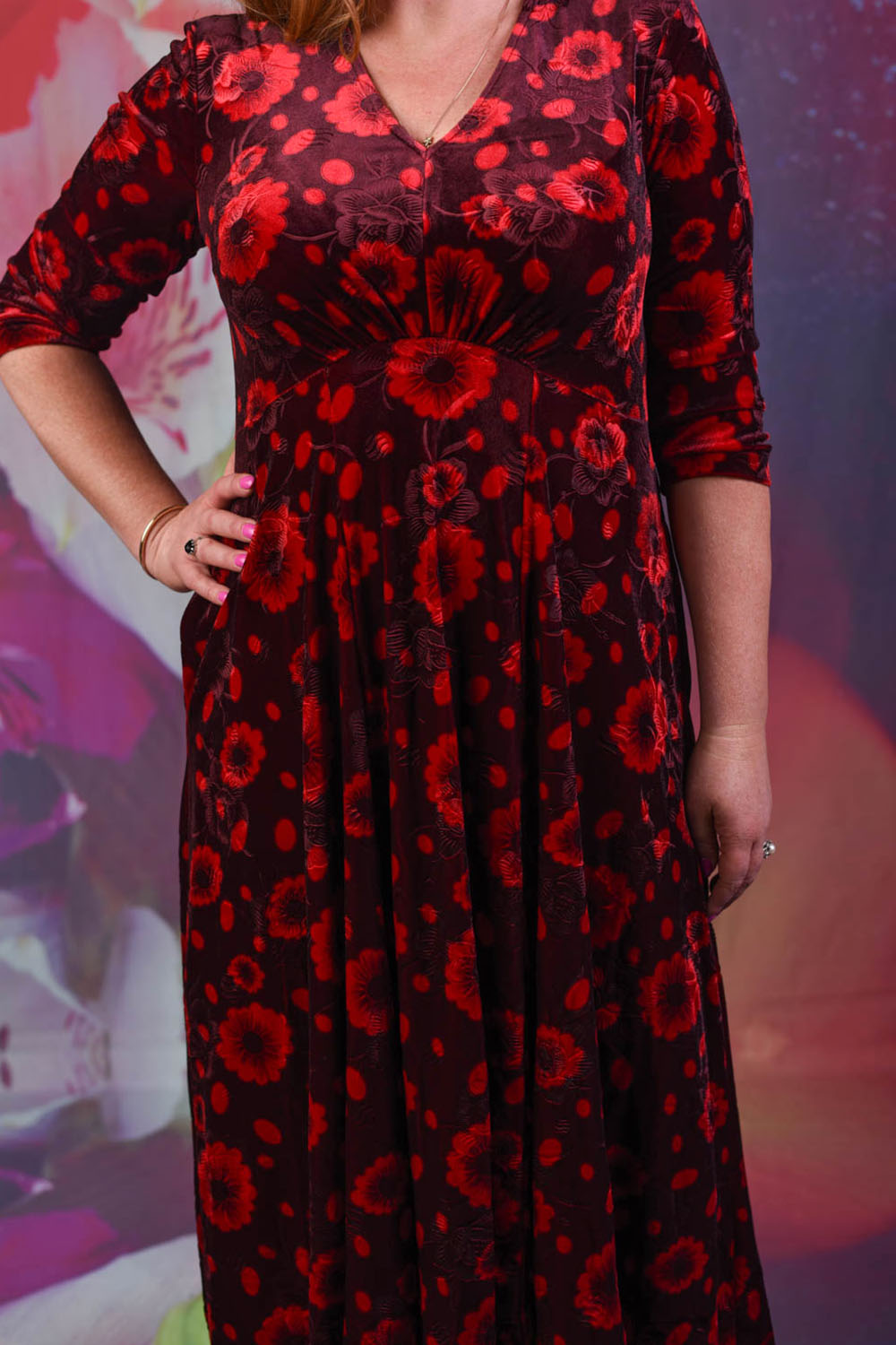 Close-up of the Annah Stretton Veronica Jude Dress in red floral spot