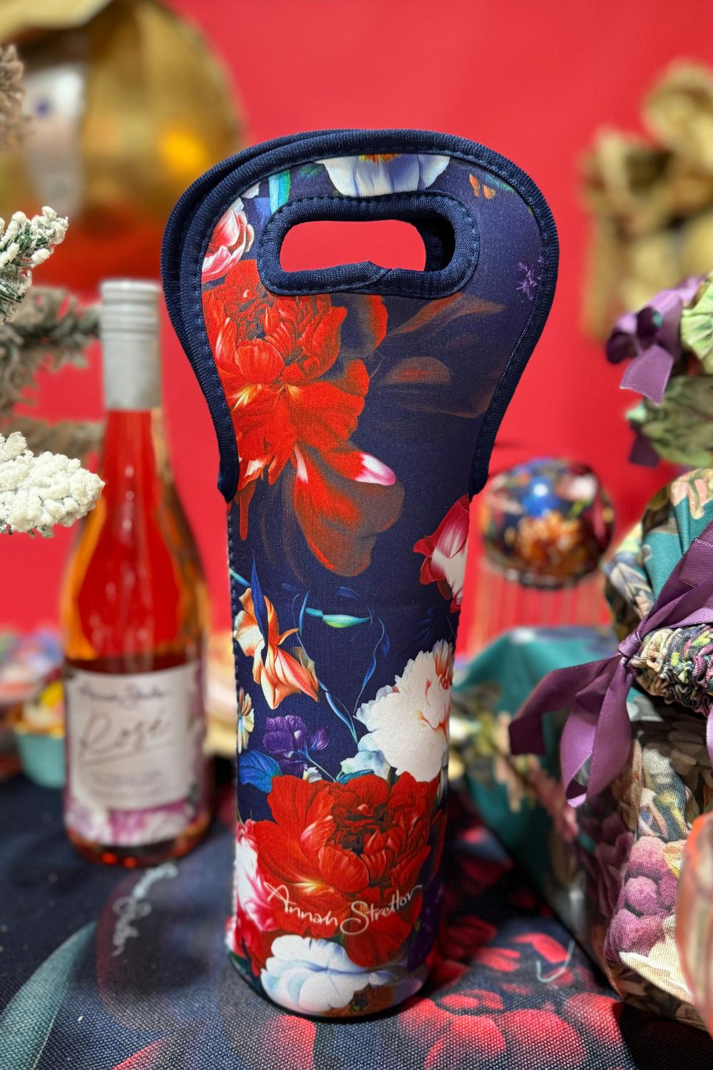 Annah Stretton Petal Chorus neoprene wine bag – insulated Christmas wine carrier