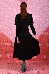model wearing winter rose black spot dress