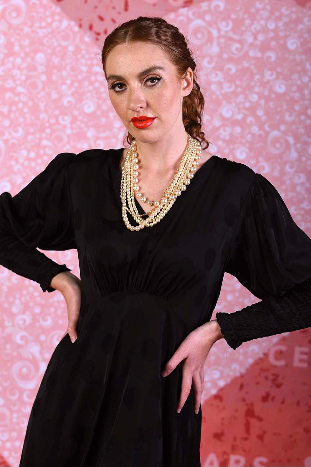 model wearing winter rose black spot dress