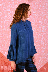 model wearing Renne Rose slate blue top