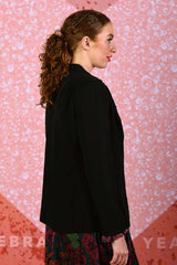 model wearing indeira black jacket