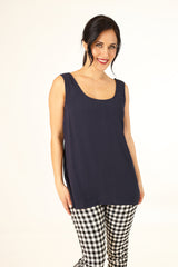 Model wearing Spring Iris tank top in Navy by Annah stretton