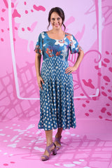 Model wearing alexandrine dress by Annah Stretton
