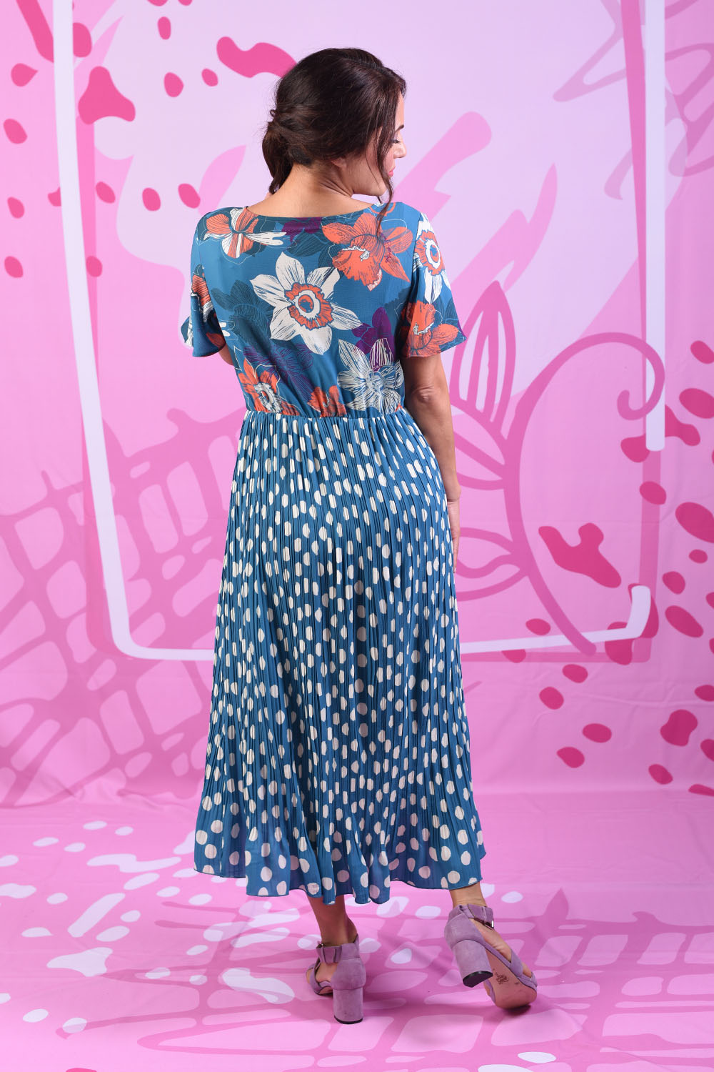 Model wearing alexandrine dress by Annah Stretton