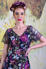 Close-up of model wearing the Annah Stretton Allure Angel Dress