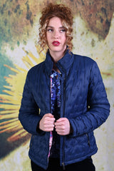 Model wearing the Annah Stretton Ambrosia Puffer Jacket in Navy