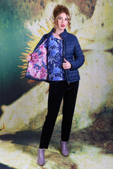 Model showing floral interior of the Ambrosia Puffer Jacket