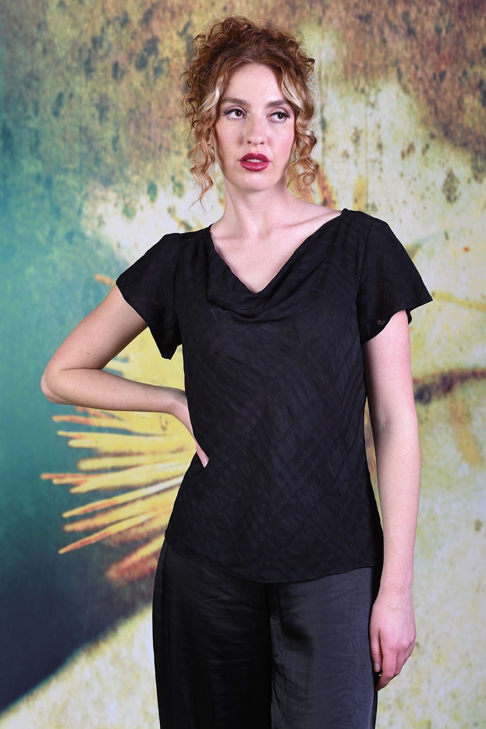 Model wearing the Annah Stretton Bijou top in black
