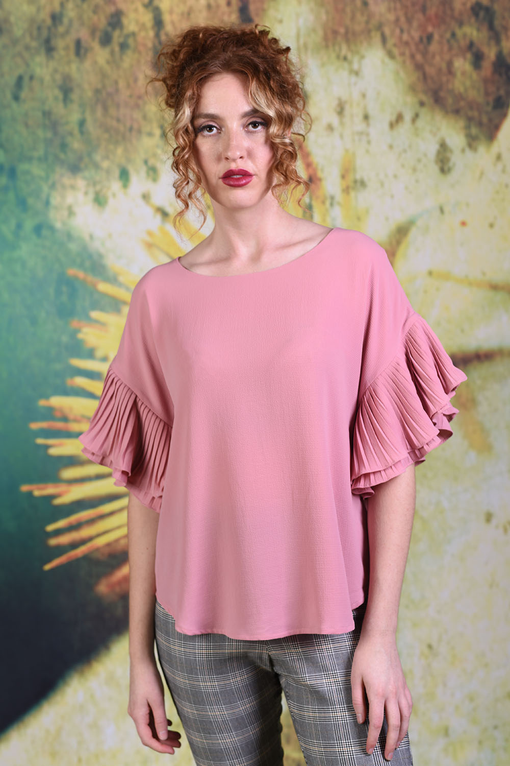 Model wearing the Annah Stretton Dayna top in pink