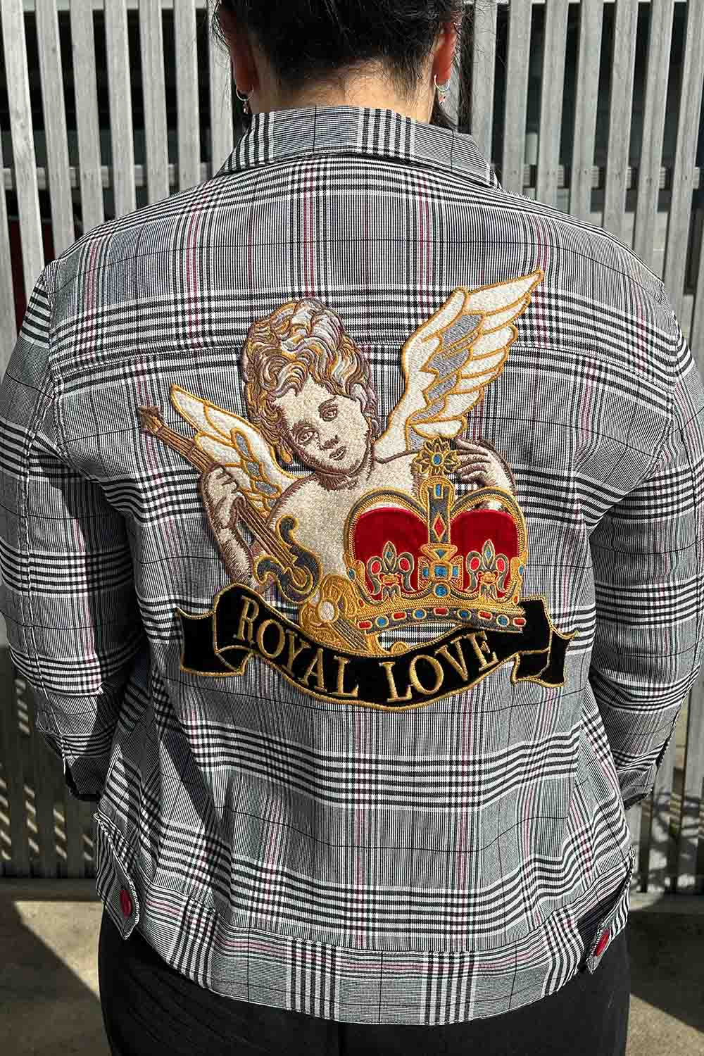 The back of the DJ Royal Love jacket showing an embossed royal love cherub design