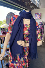 The Annah Stretton Dolly Scarf in navy on a mannequin
