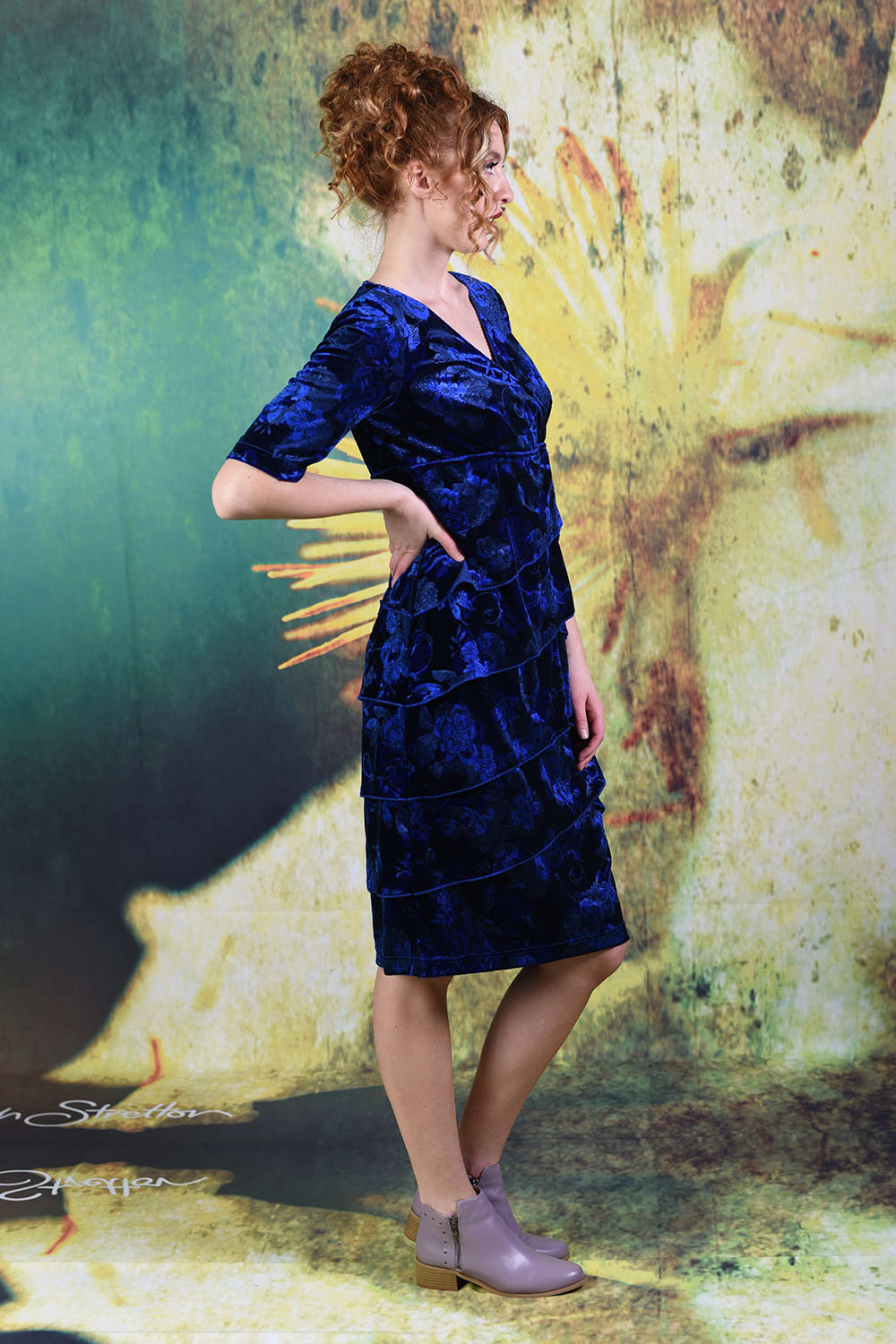 Side of model wearing the velvet Fill The Sky Dress in cobalt
