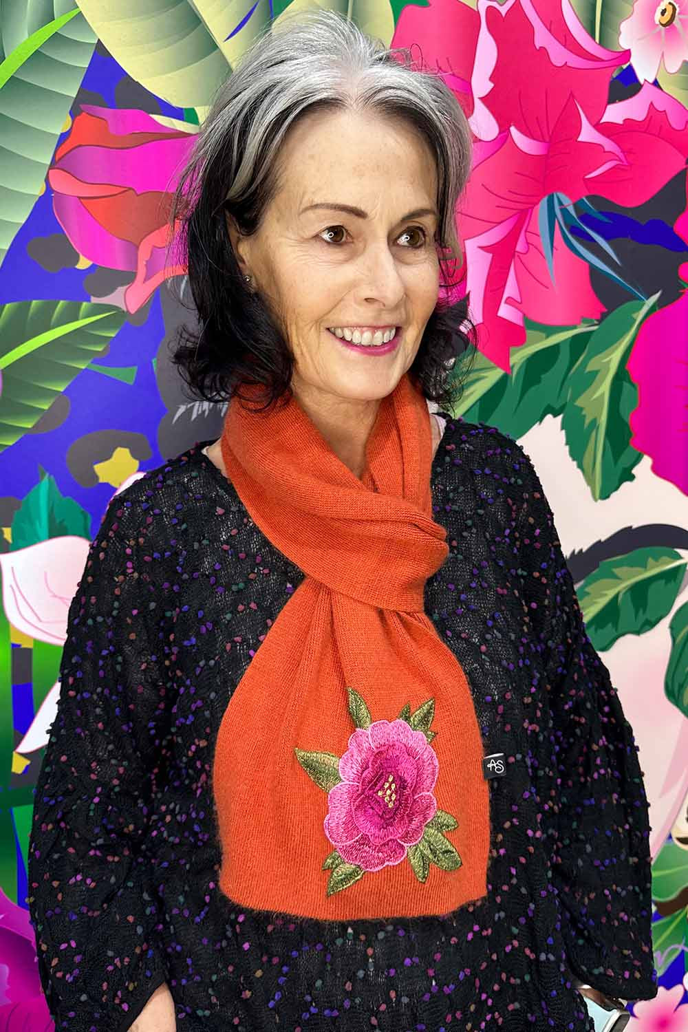 Annah wearing the Freya Cashmere Scarf in orange