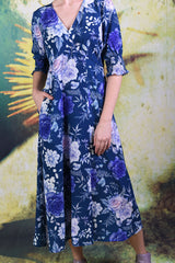 Close-up of slate blue rose floral pattern on the Annah Stretton Jax dress