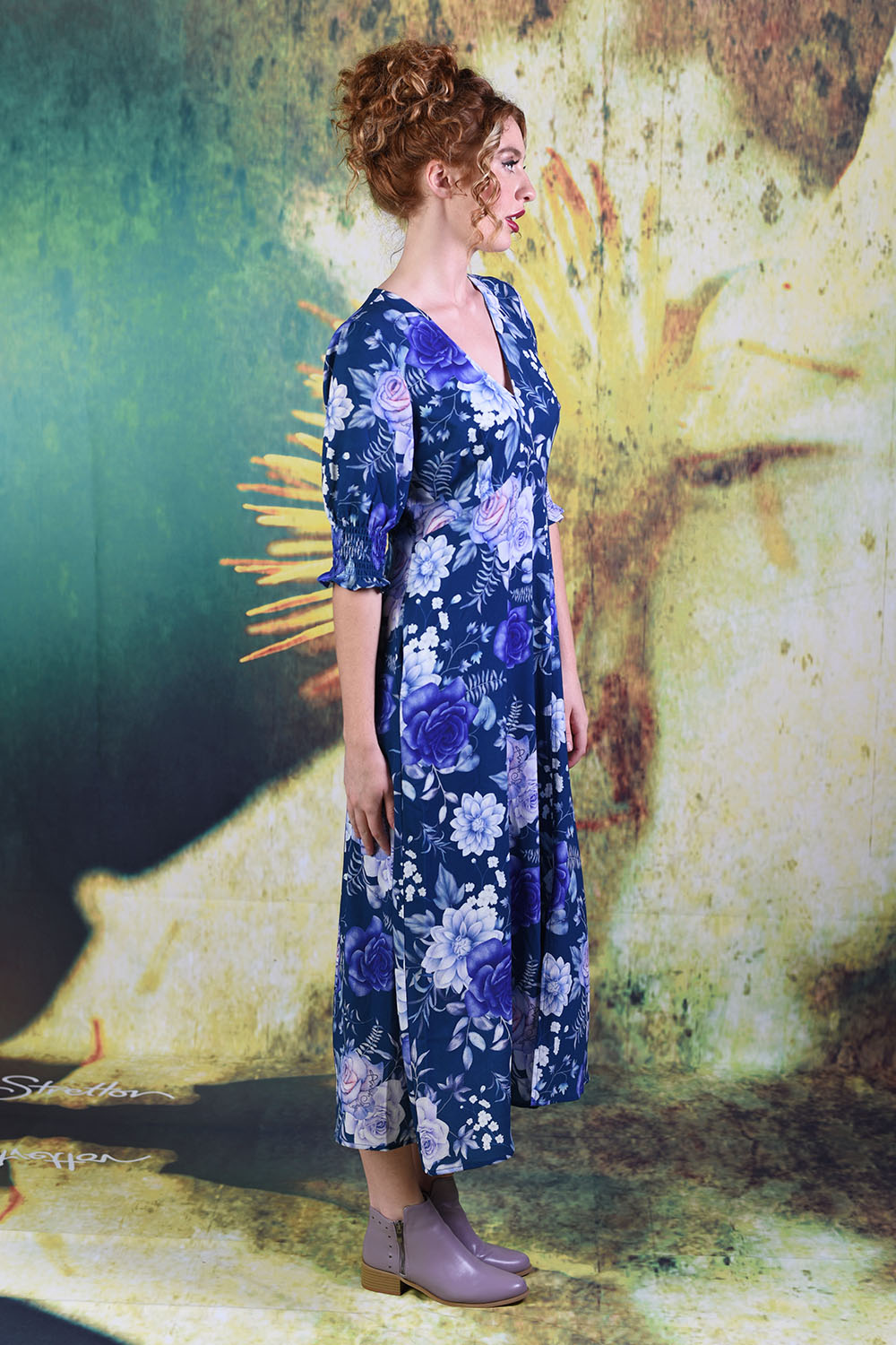 Side of model wearing the Annah Stretton Jax Dress in slate