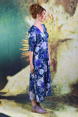 Side of model wearing the Annah Stretton Jax Dress in slate