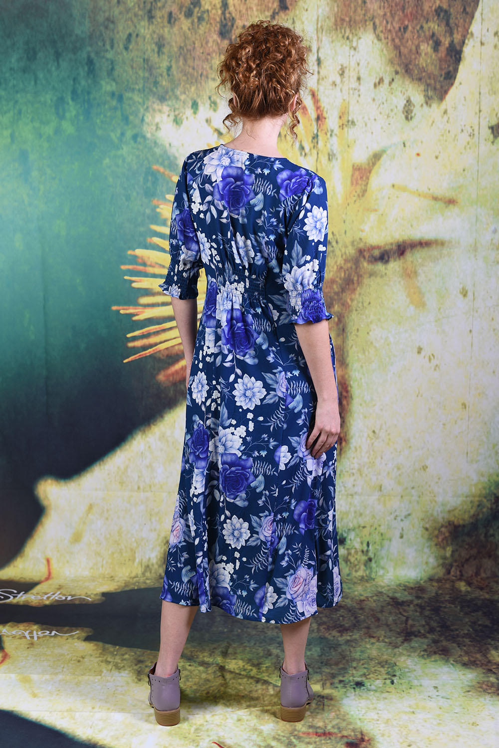 Back of model wearing the Annah Stretton Jax Dress in slate
