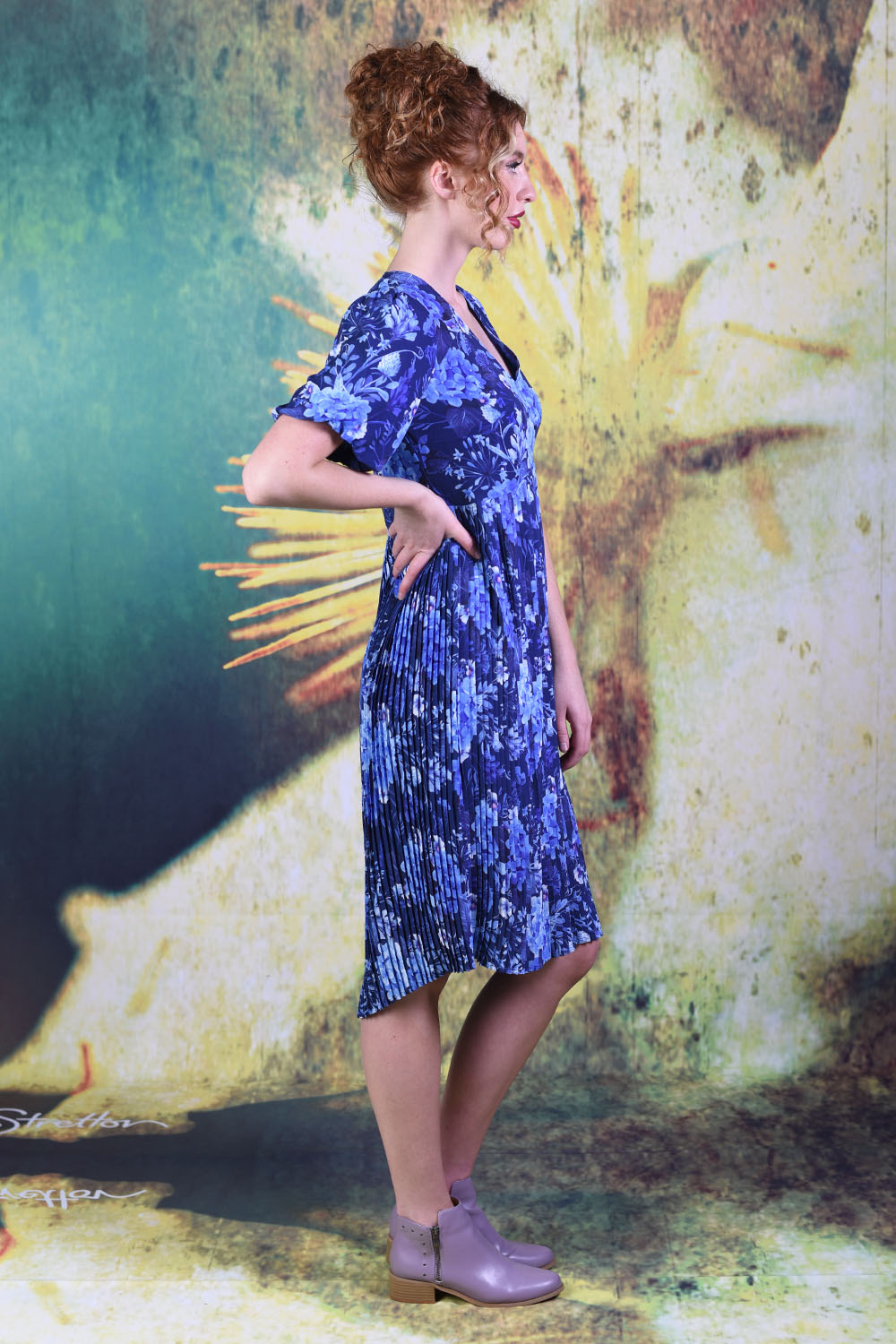 Side of model wearing the Annah Stretton Juniper Blaise dress