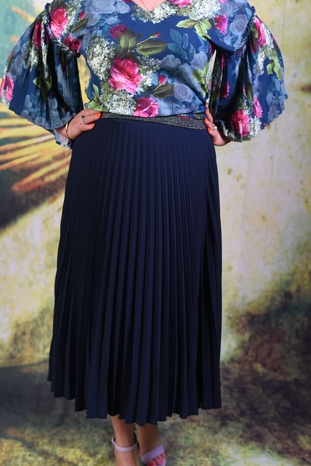 Close-up of another model wearing the Annah Stretton Mila skirt