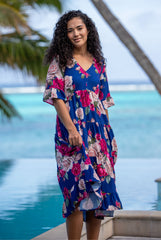 Model wearing magic dress in navy millie print by annah stretton