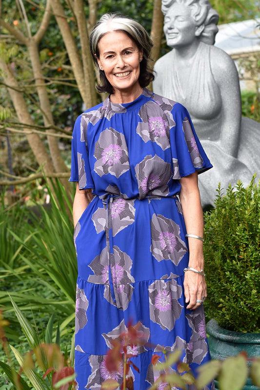 annah stretton wearing marigold dress in navy