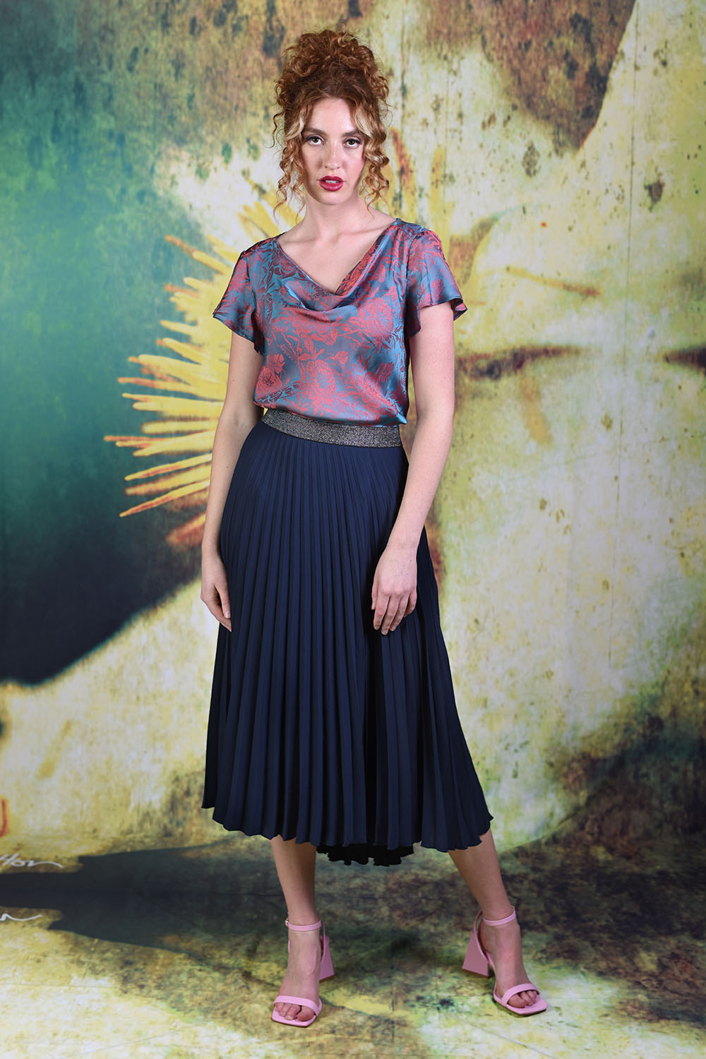 Model wearing the Annah Stretton Mila Skirt in navy