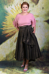 Model wearing the Annah Stretton Miriam Max skirt in gold