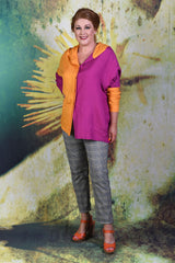 Model posed slightly to the side wearing the Annah Stretton Periwinkle shirt