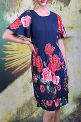 Close-up shot of the Pleat me Juliet Dress in peony