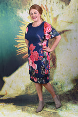 Model wearing the Annah Stretton Pleat Me Juliet dress