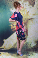 Model wearing the Pleat Me Juliet Dress in peony