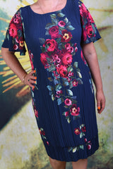 Closer shot of pleated fabric of the Annah Stretton Pleat Me Juliet Dress in rose