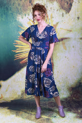 Model wearing the Annah Stretton Primrose dress in navy