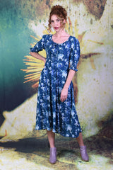 Model wearing the Annah Stretton Qwin dress in sapphire