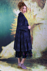 Side of model wearing the Annah Stretton Remi Jacket in purple