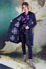 Interior of Remi Jacket in purple which features a deep purple floral design