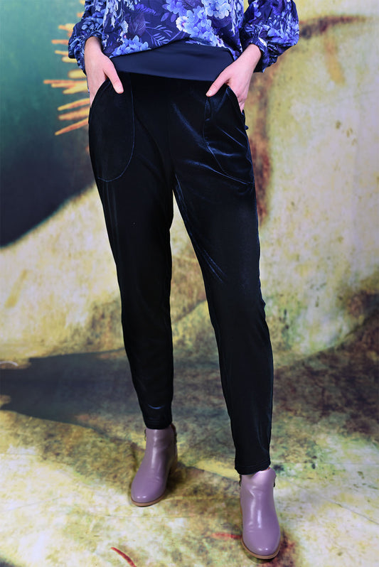 Model wearing the Annah Stretton Vesta Velvet pants in navy