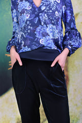 Closer-up of navy velvet fabric of the Vesta Velvet pants