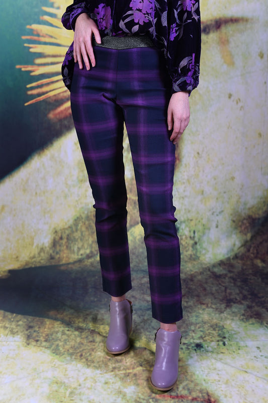 Model wearing the Annah Stretton Vita Aura Pants in Purple Plaid