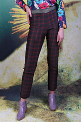 Model wearing the Annah Stretton Vita Aura Pants in Red Plaid