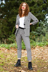 model wearing winn check jacket with posy floral top.