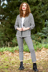 model wearing winn check jacket with posy floral top.
