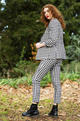 model wearing winn check jacket with posy floral top.